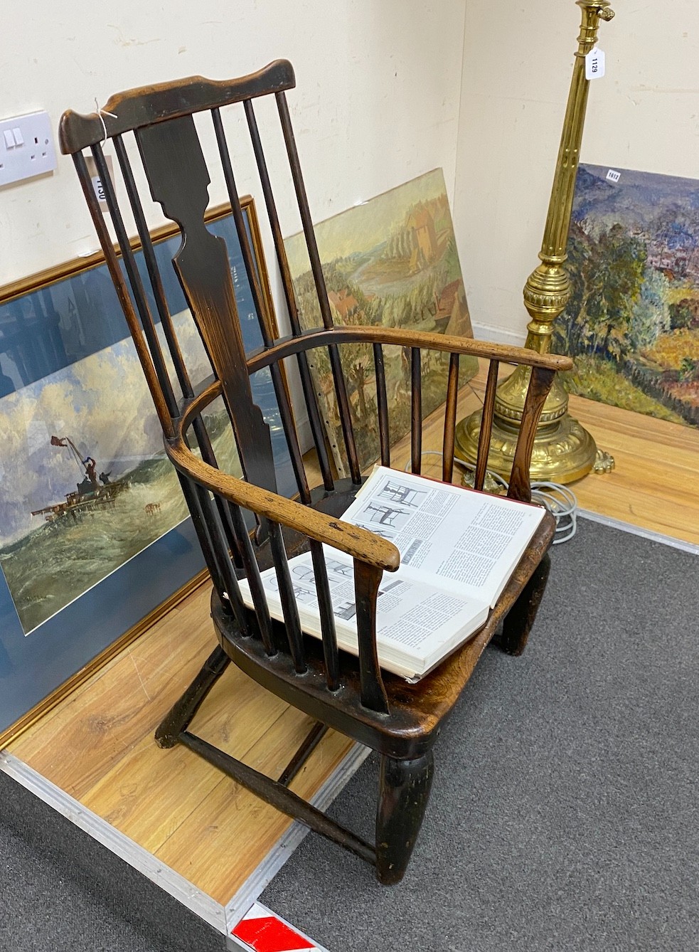 A mid 18th century West Country ash and elm Windsor armchair, (cut down), width 61cm, depth 41cm, height 99cm. (See figure SW31 page 271 Bernard Cotton The English Regional Chair).